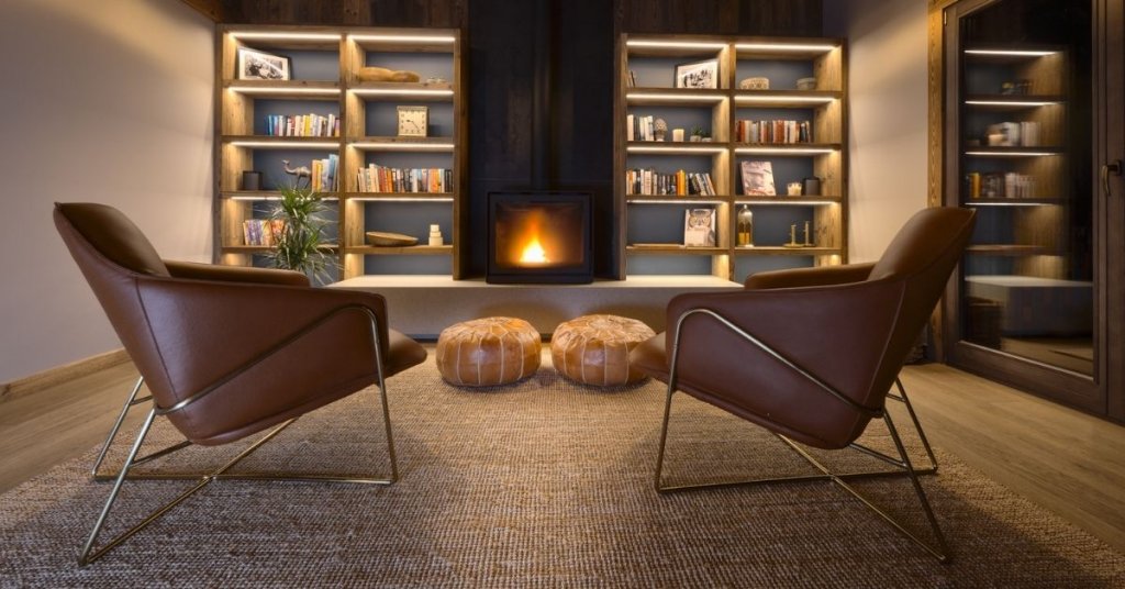 Chalet Vesper's stylish modern fireplace and seating area