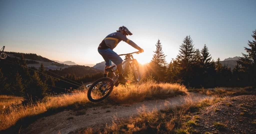 Performing a mountain bike trick in Les Gets