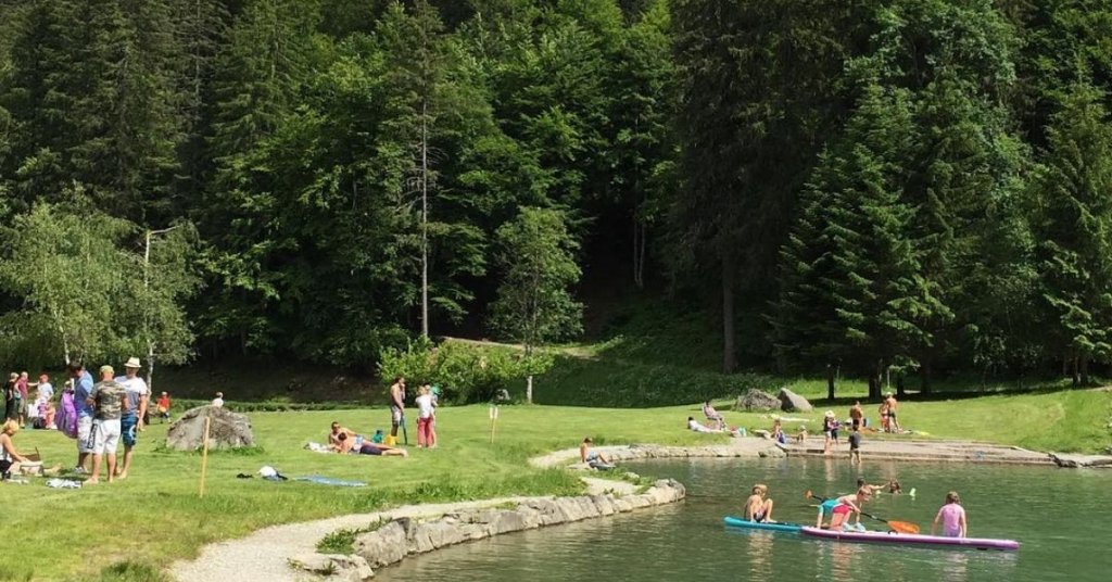 Swimming in Lac Montriond, Les Gets in summer