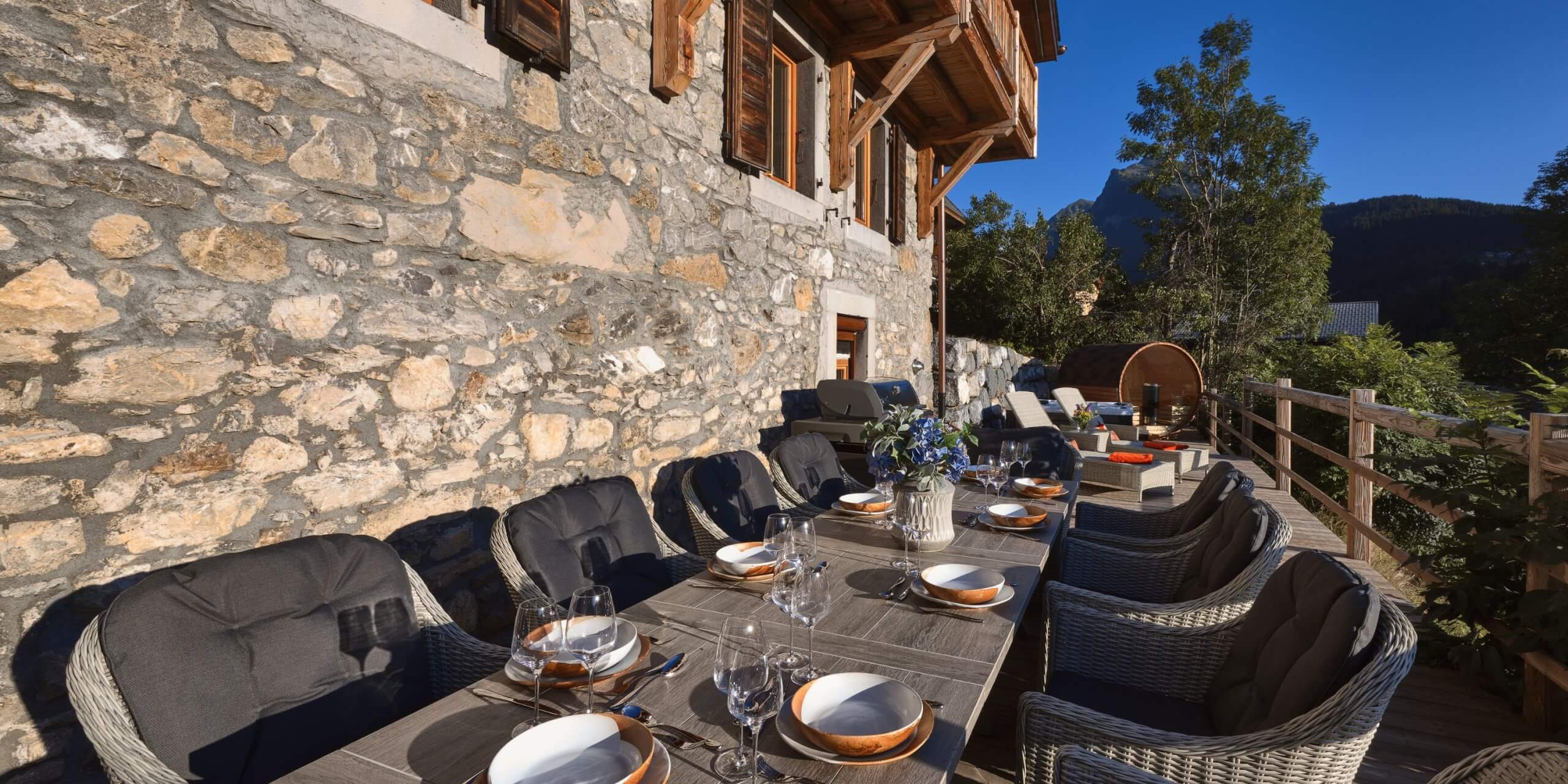 The Old Macaroni in Morzine, outdoor dining table on balcony views